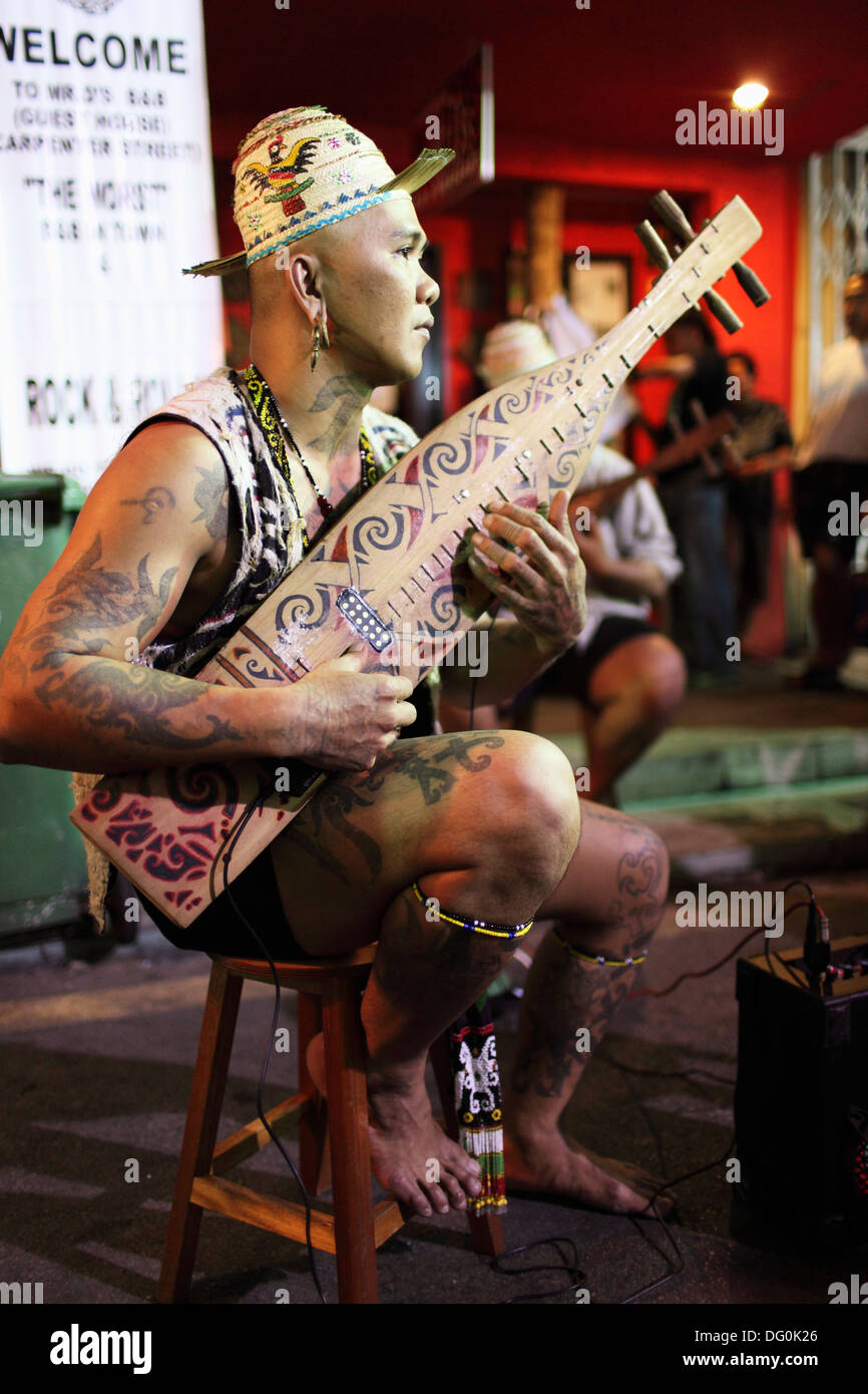 An Iban Playing The Traditional Music Instrument Taken At Carpenter Stock Photo Alamy