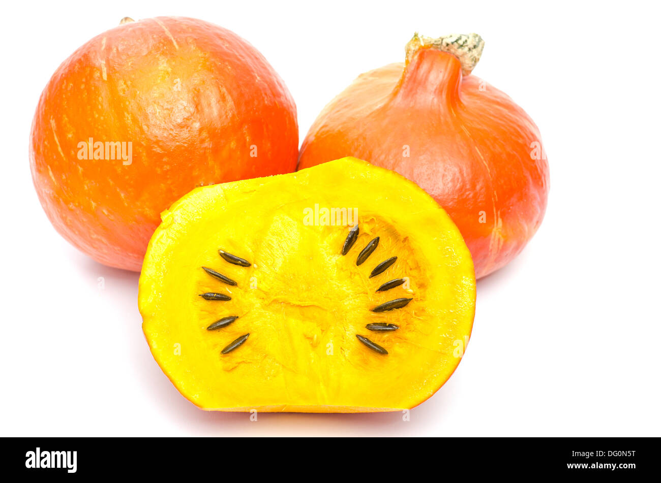 Pumpkin with seeds on white background Stock Photo