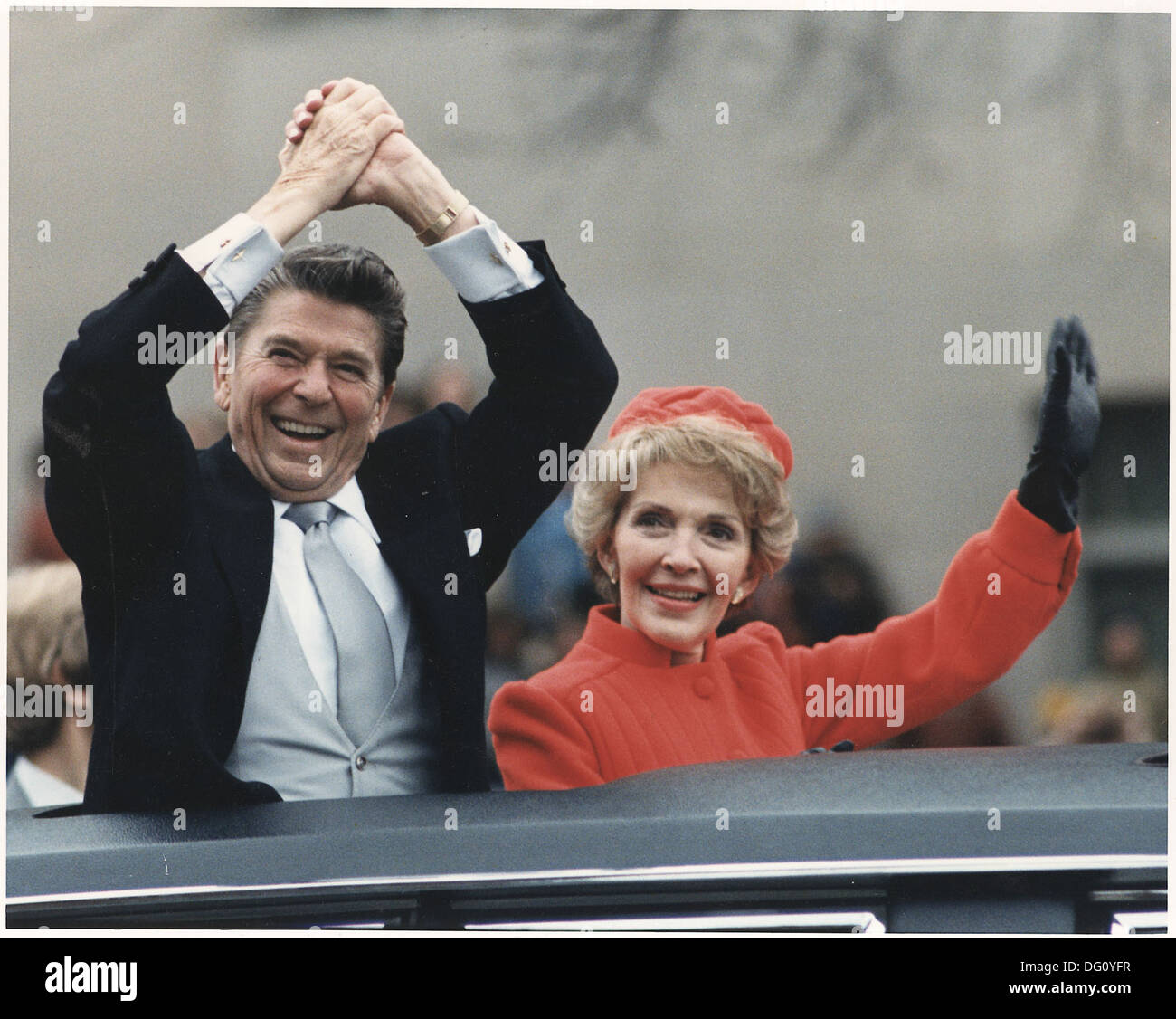 Photograph of The Reagans waving during the Inaugural Parade 198507 Stock Photo