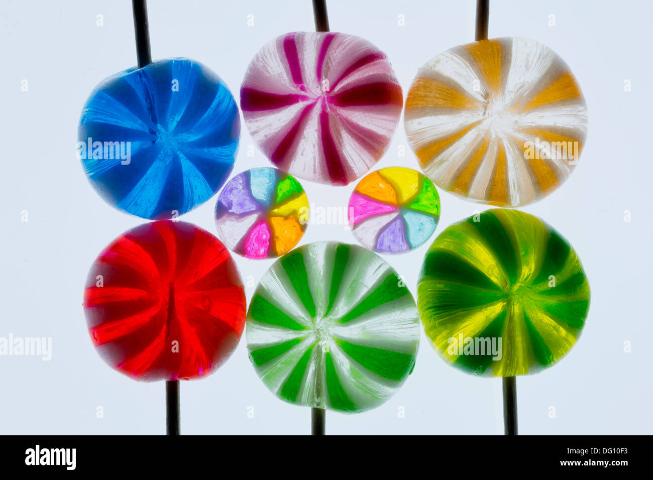 Japanese candy lollipops photographed with a 100mm macro lens over a daylight balanced light box. Stock Photo