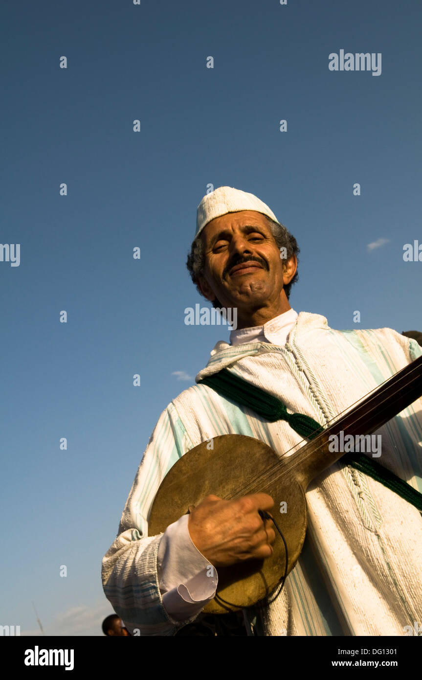 Moroccan musicians playing traditional musical instruments in the Djma