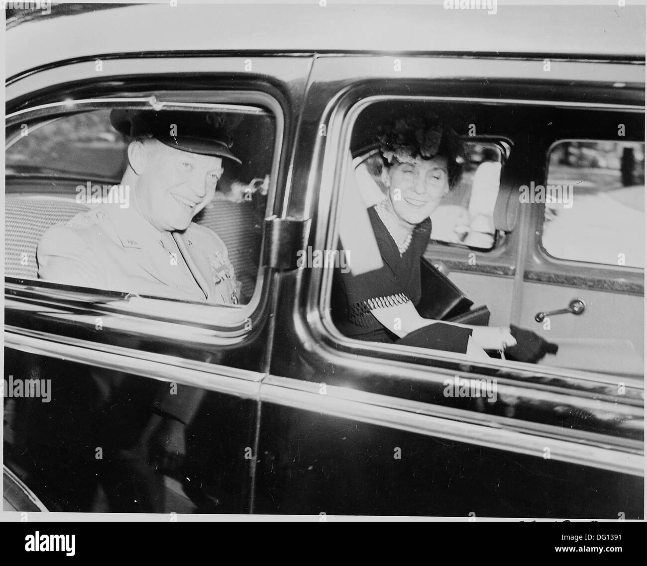 Photograph of General Dwight D. Eisenhower and Mrs. Eisenhower, smiling ...