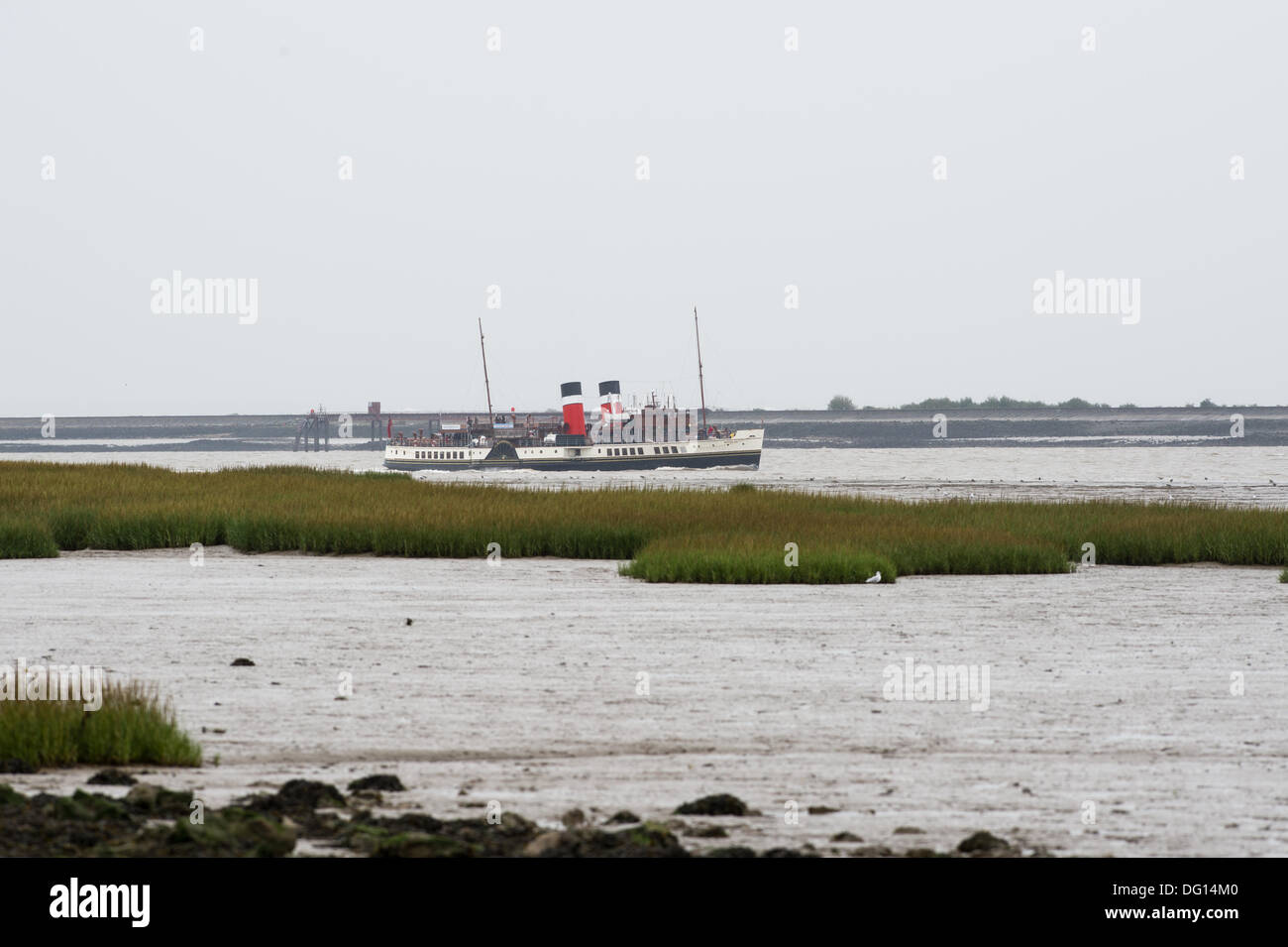 East Tilbury, Essex, UK. 11th October 2013. The Waverley, the world's last ocean going paddle steamer makes her way past the historic Coal House Fort at East Tilbury, Essex. The Waverley is on her last weekend in the Thames before returning to Scotland where she is based. Hardy passengers endured the deck for her journey from Southend Pier to Gravesend in Kent. Credit:  Allsorts Stock Photo/Alamy Live News Stock Photo