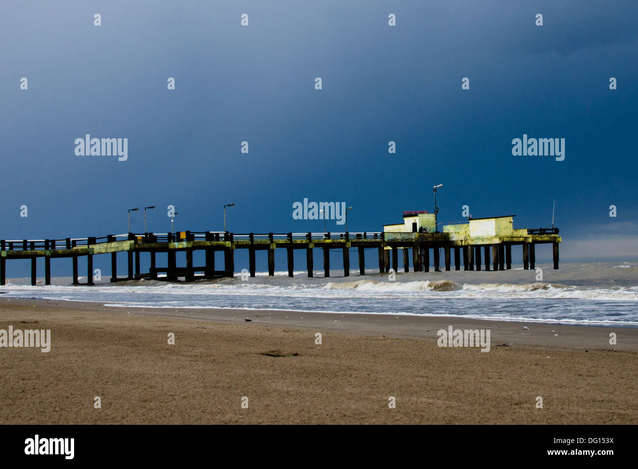 old fishing pier at the beach in San Clemente del Tuyu, Argentina. Stock Photo
