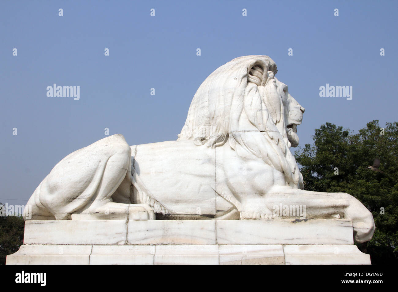 Antique Lion Statue in sky background at Victoria Memorial Gate