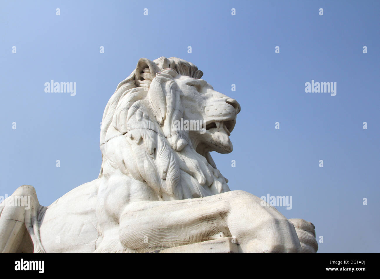 Antique Lion Statue in sky background at Victoria Memorial Gate
