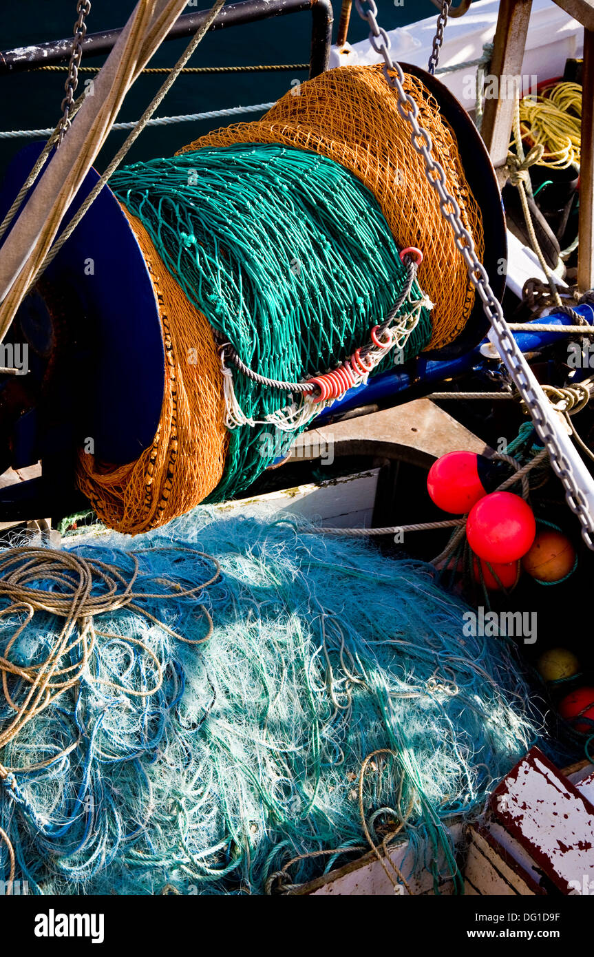 Fishing nets and buoys on a boat Stock Photo