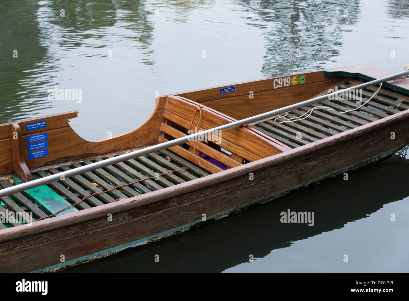 A punt in Cambridge with a lump sawn out of the side - an act of vandalism Stock Photo