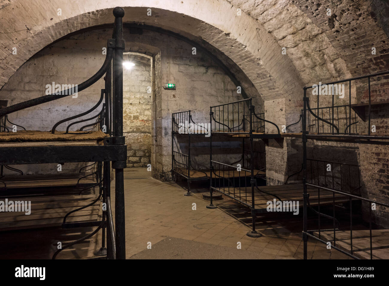 Dormitory with metal bunks in the First World War One Fort de Vaux at Vaux-Devant-Damloup, Lorraine, Battle of Verdun, France Stock Photo
