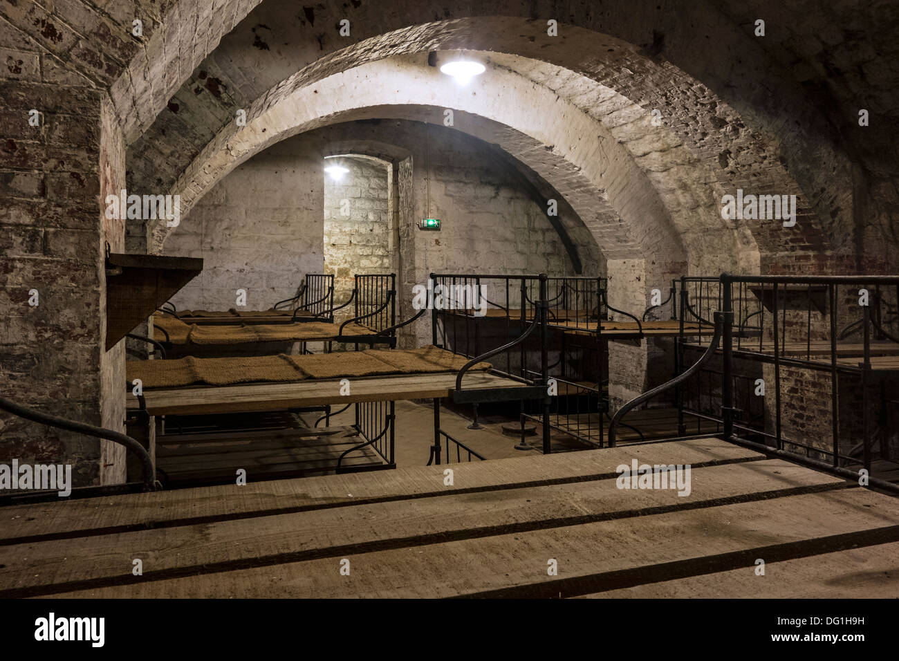 Dormitory with metal bunks in the First World War One Fort de Vaux at Vaux-Devant-Damloup, Lorraine, Battle of Verdun, France Stock Photo