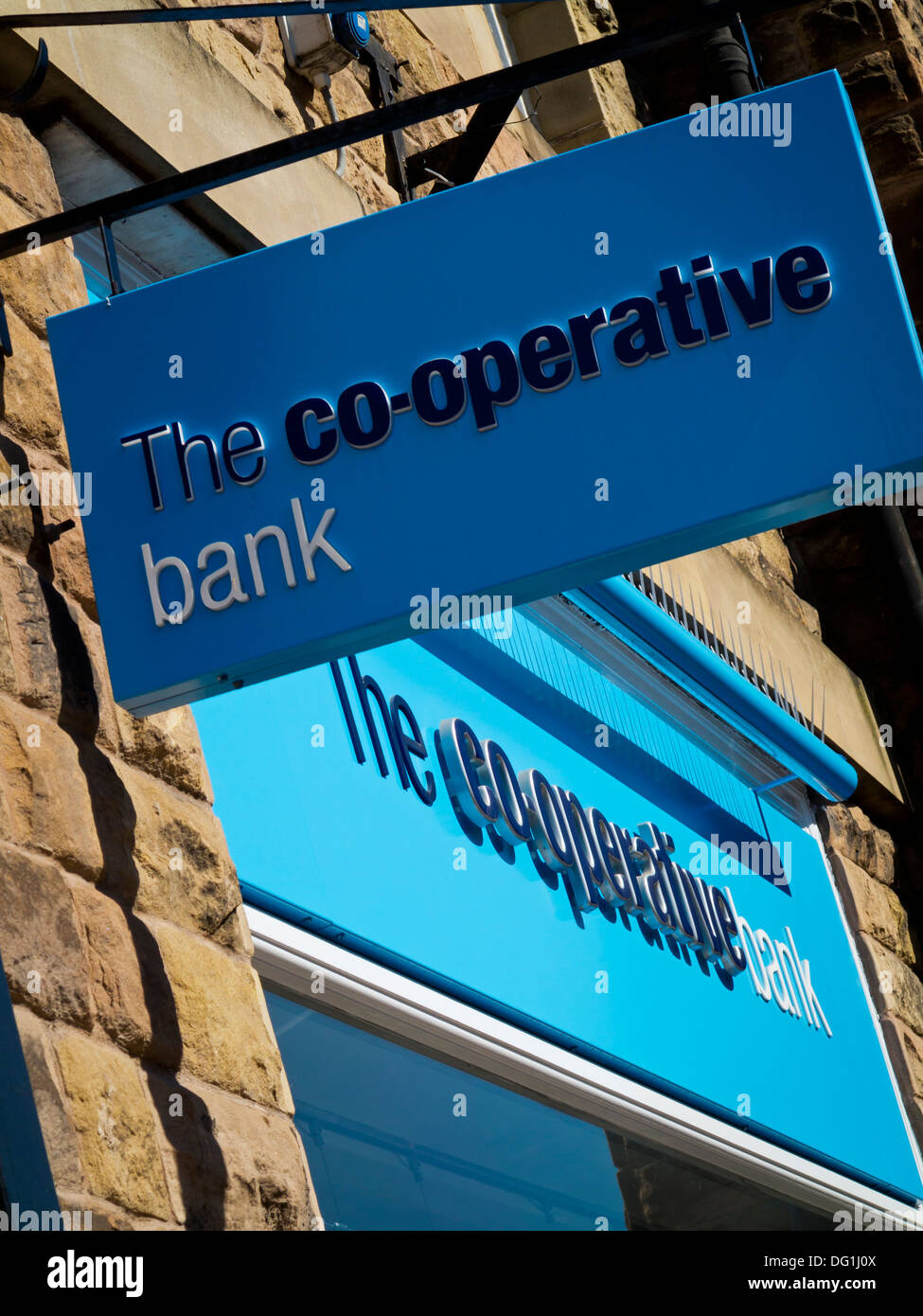 Sign outside a high street branch of the Co-operative Bank in Matlock Derbyshire England UK Stock Photo