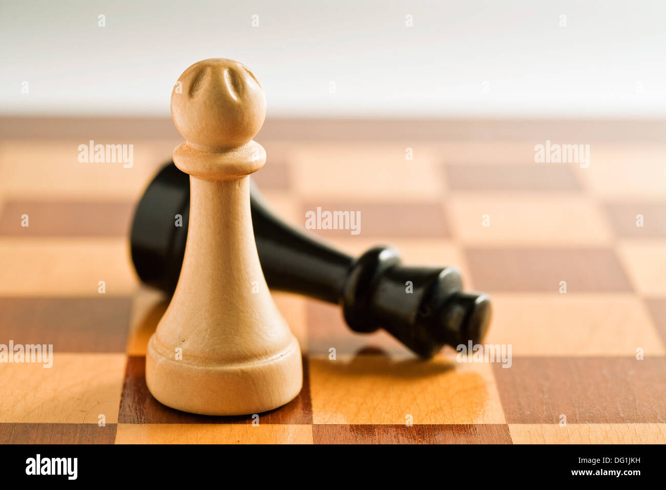 White queen and black king, traditionally confronted in chess game