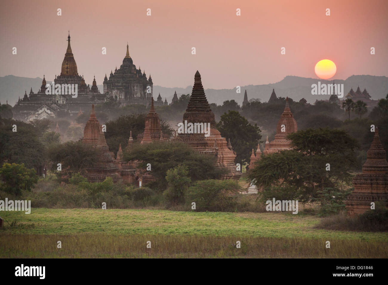 Ananda Temple on left and Thatbyinnyu Temple adjacent to Ananda Temple, at sunset, Bagan, Myanmar, (Burma) Stock Photo