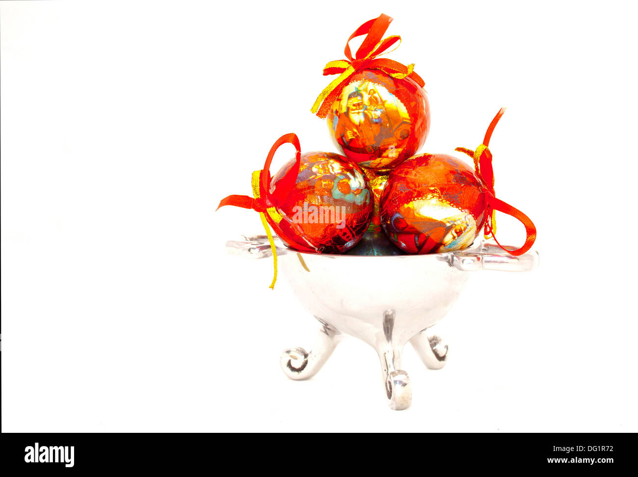 Christmas tree baubles in a silver cup Stock Photo - Alamy