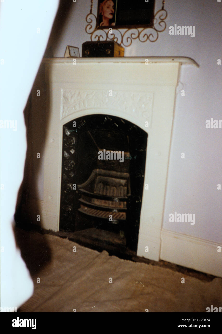 Close Up Of Small Victorian Fireplace In Bedroom Before