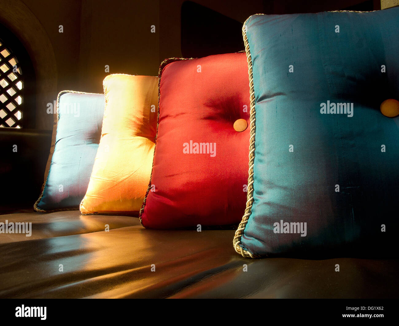 Colorful Silk Pillows on Leather Sofa, Close Up Stock Photo Alamy