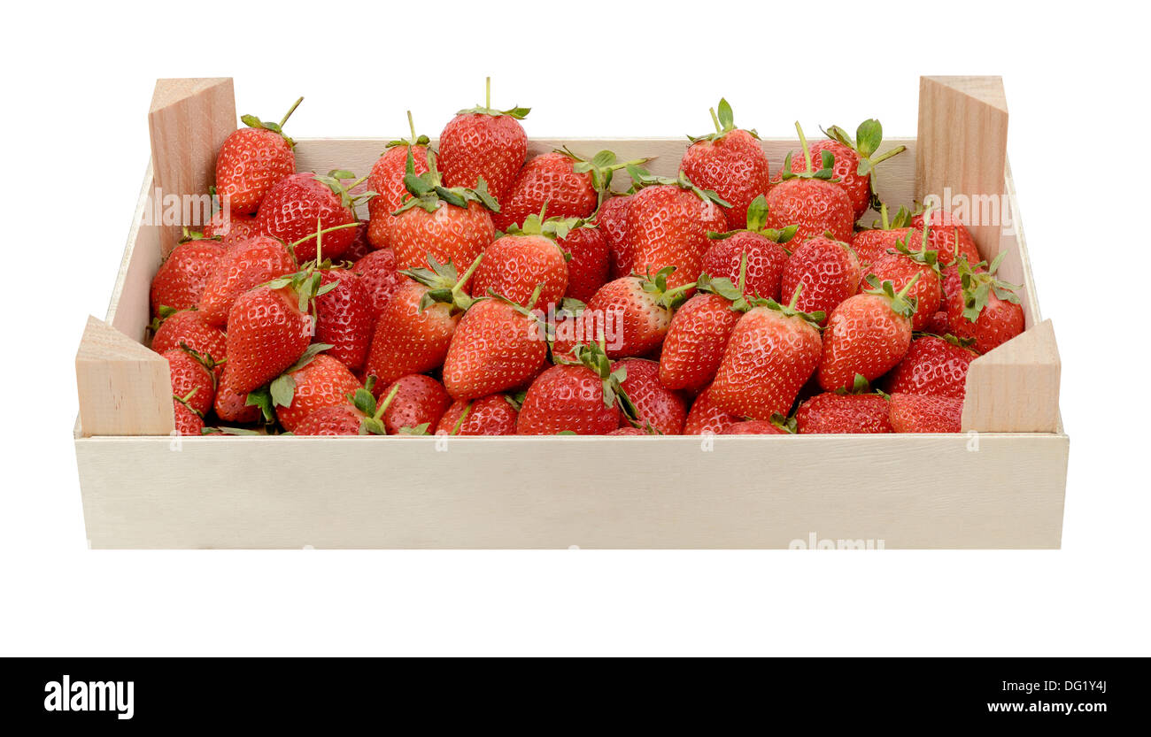 Fresh strawberries in wooden crate Stock Photo