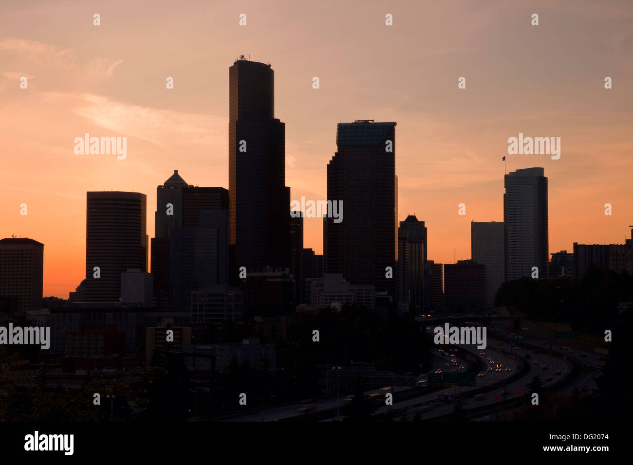 WASHINGTON - Silhouette of the highrises in downtown Seattle and Interstate 5 at sunset. Stock Photo