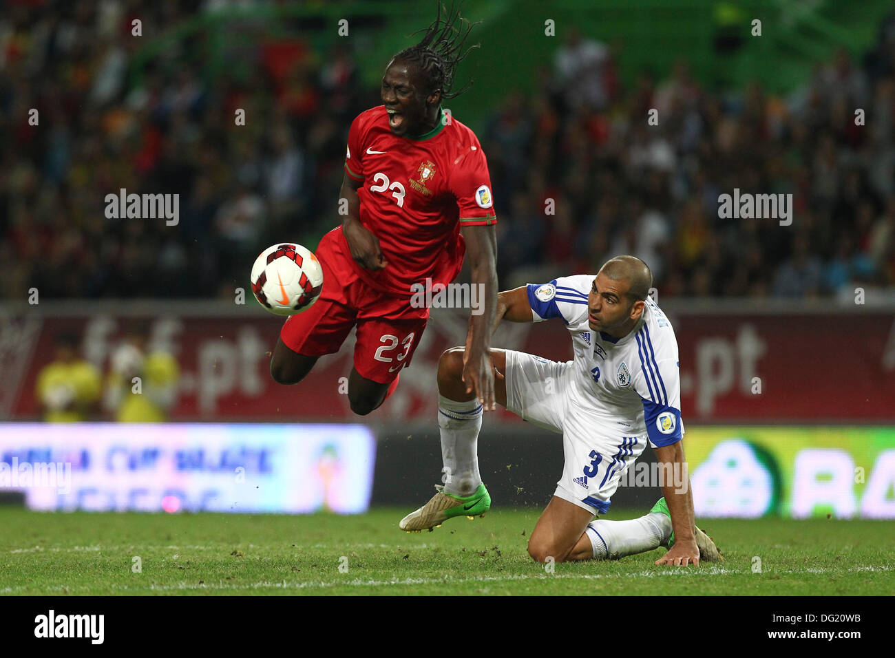 Lisbon, Portugal. 11th Oct, 2013. Eder Lopes, Portugal forward (L) and Tal Ben-Haim, Israel defender (R) during the qualifying soccer match for the Brazil 2014 FIFA World Cup, between Portugal and Israel, on October 11, 2013, in Alvalade stadium in Lisbon. Credit:  Action Plus Sports/Alamy Live News Stock Photo