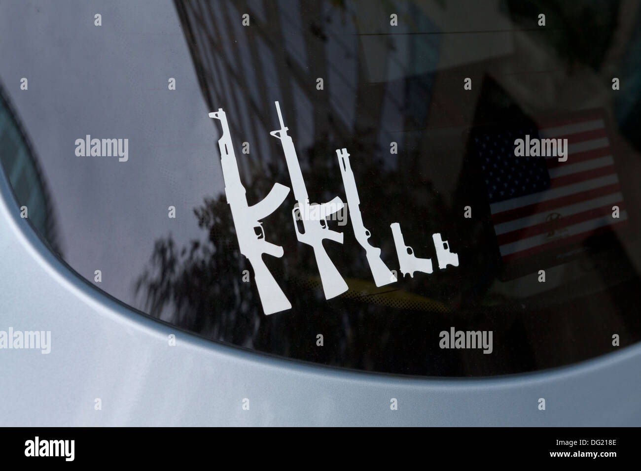 Gun family stick figures on rear windshield - USA Stock Photo