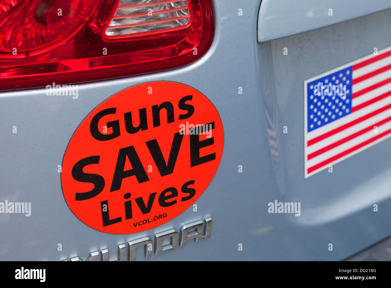 Guns save lives sticker - USA Stock Photo