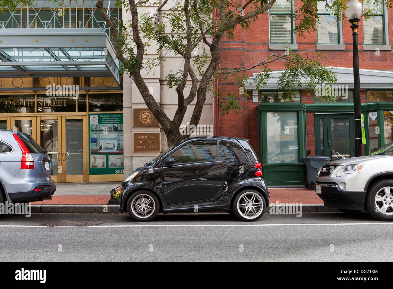 SmartCar parked leaving lots of space - USA Stock Photo