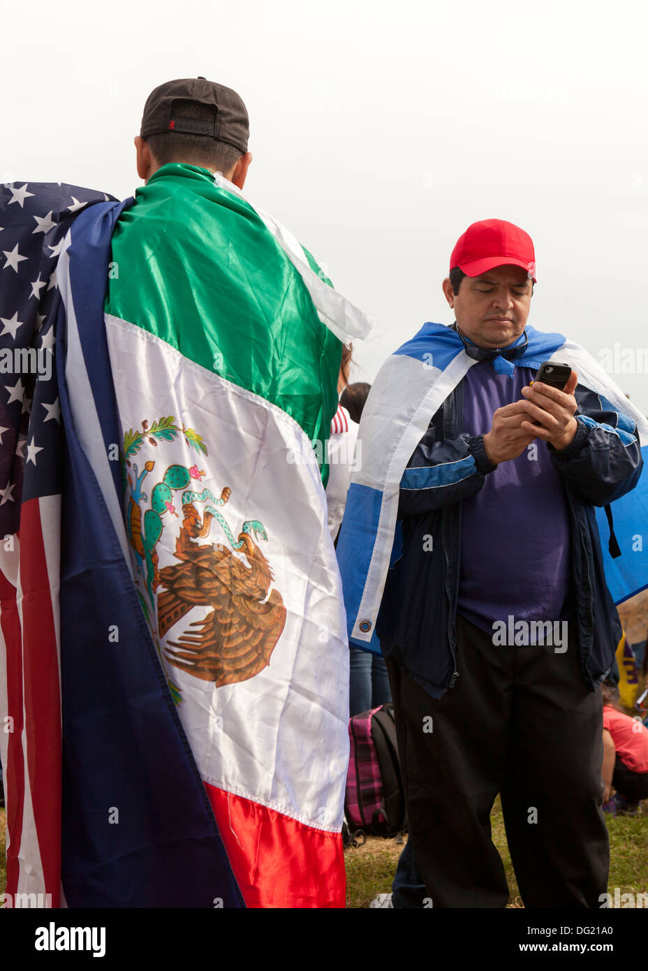 Man wearing a Mexican and American flag at Immigration Reform rally - Washington, DC USA Stock Photo