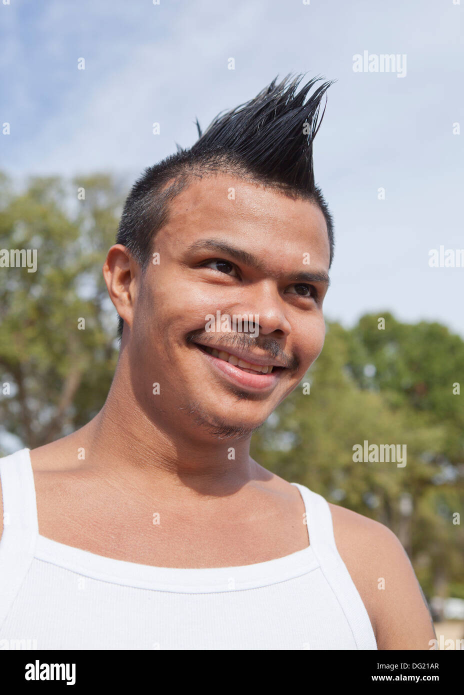 Young Latino man with Mohawk Stock Photo