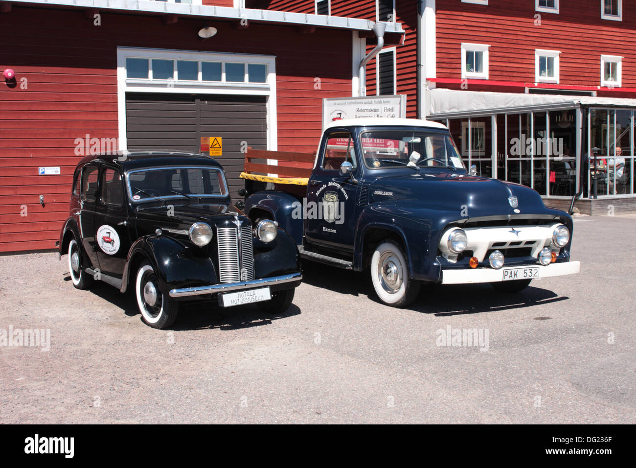 Two old vehicles parked close to the Motala Motor Museum Sweden Stock Photo