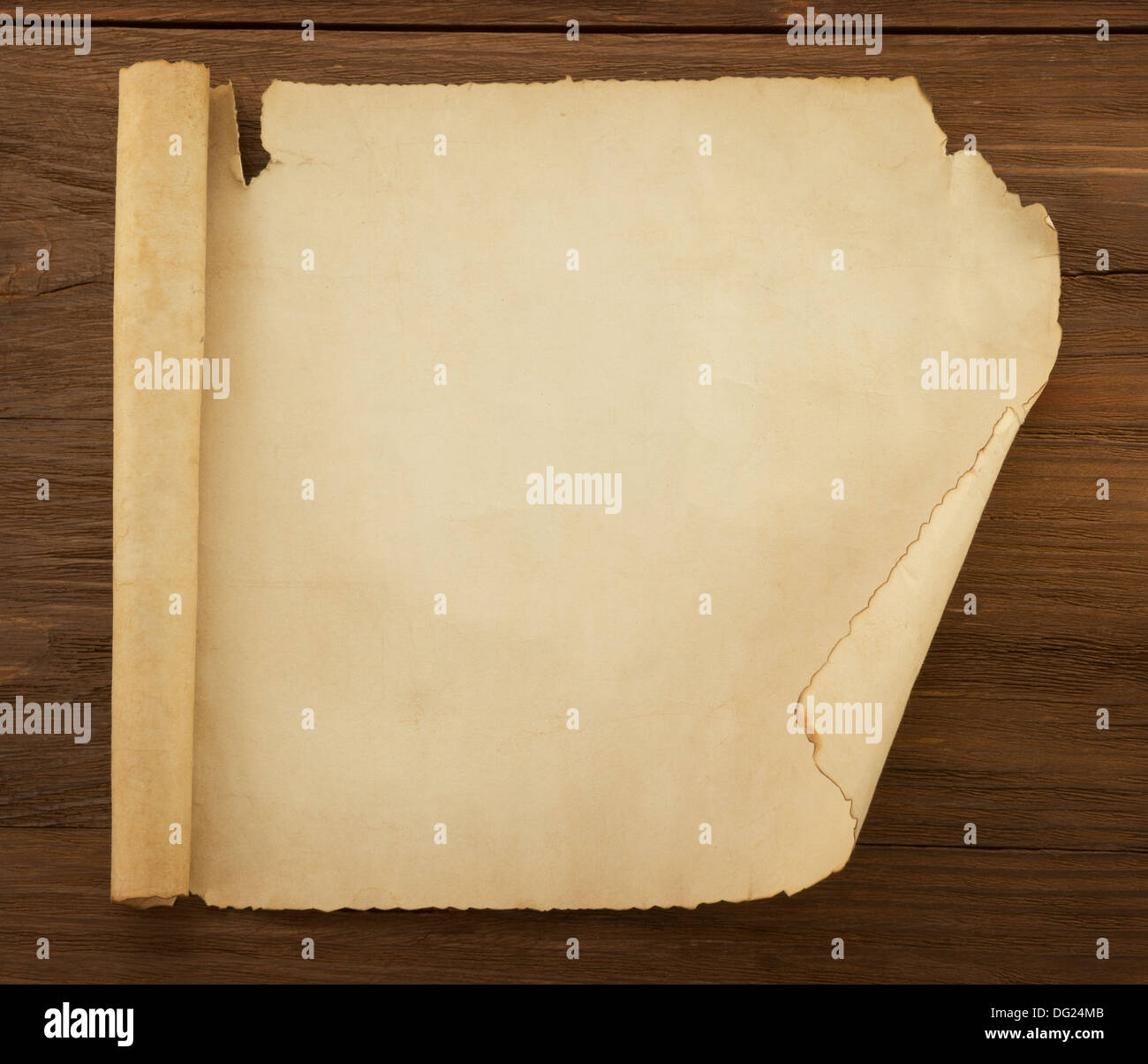 parchment scroll on wood background Stock Photo