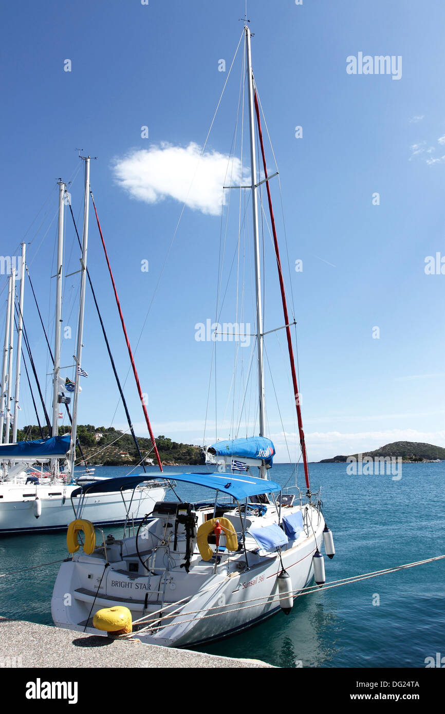 Yachts moored in the New Port area of Skiathos Town on the Greek Island of Skiathos, a popular tourist destination in the Aegean Stock Photo
