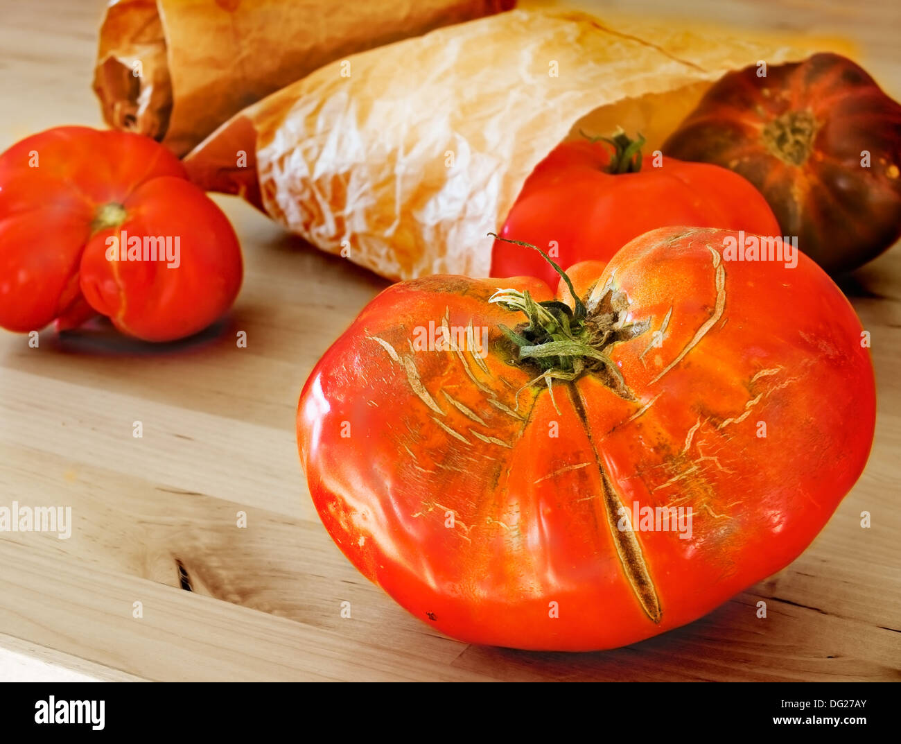 Organic tomatoes in a ecological paper bag Stock Photo