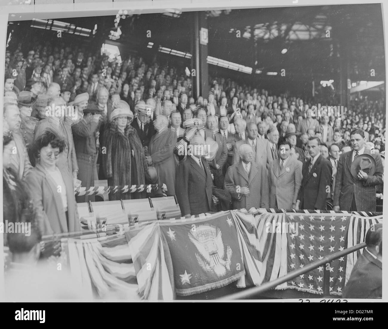 This photograph shows President Harry S. Truman standing in his box at ...