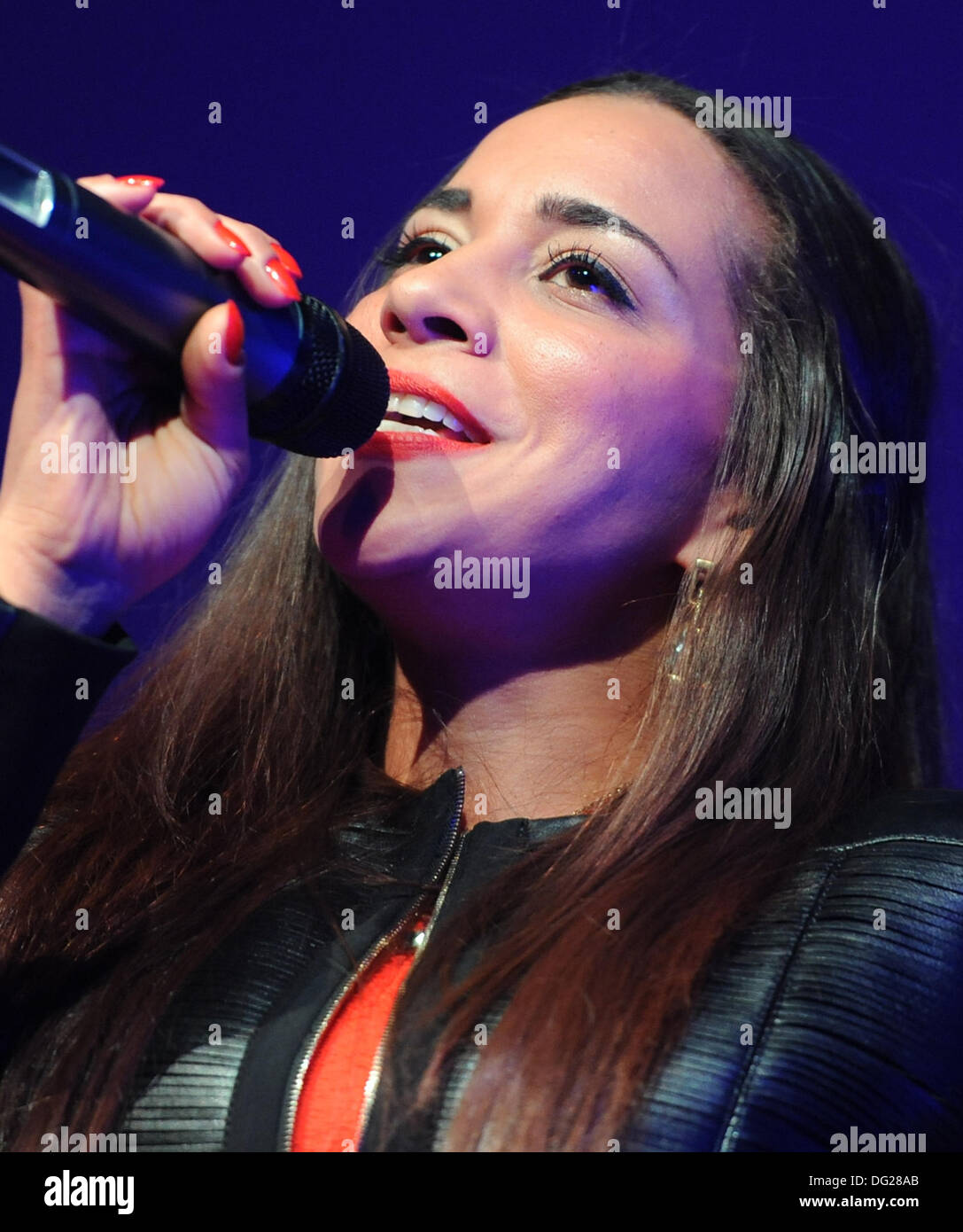 Berlin, Germany. 11th Oct, 2013. Singer Nadja Benaissa performes during the celebration of the thirty year anniversary of the German AIDS Service Organization in Berlin, Germany, 11 October 2013. Photo: BRITTA PEDERSEN/dpa/Alamy Live News Stock Photo