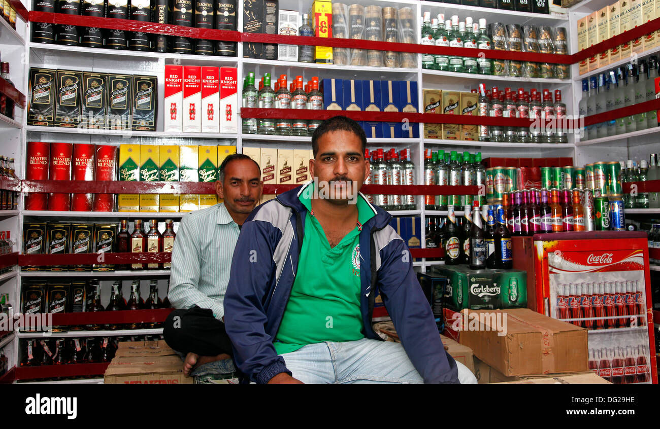 Owner of liquor store Stock Photo Alamy