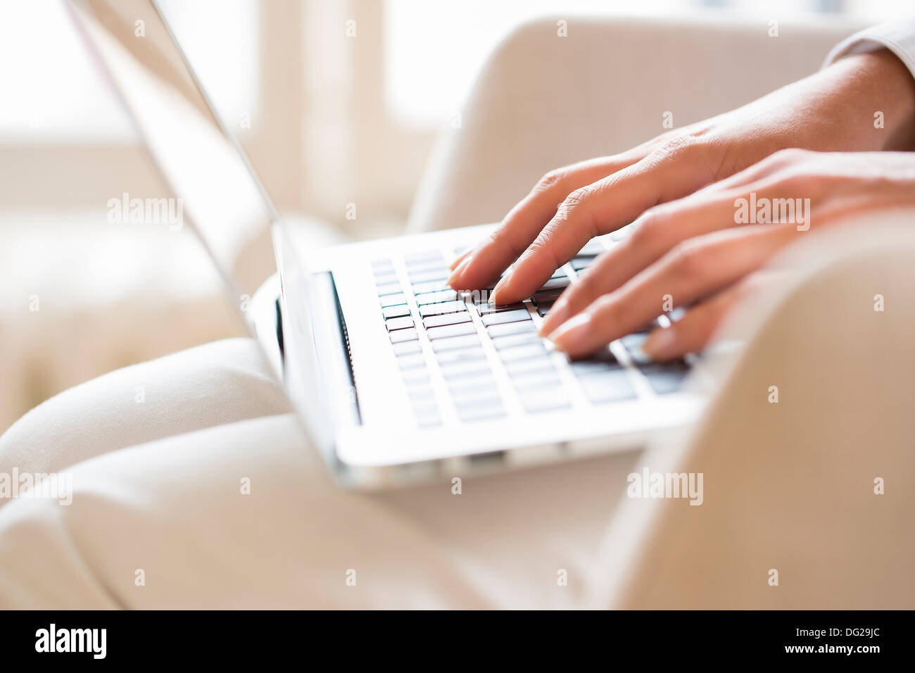 woman computer finger button desk Stock Photo