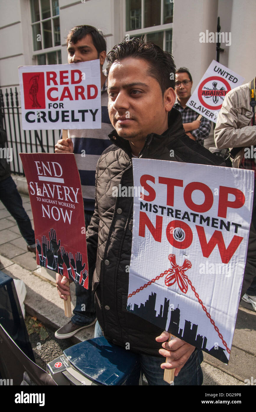 London, UK. 12th Oct, 2013. Protesters demonstrate outside the Qatar embassy against the mistreatment of Asian expatriate construction workers in Qatar building infrastructure for the Fifa World Cup. Credit:  Paul Davey/Alamy Live News Stock Photo