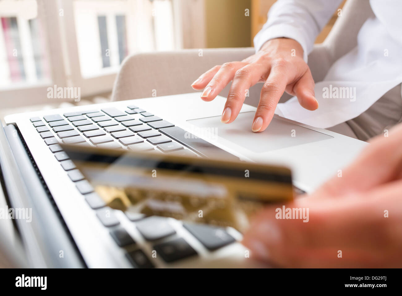 Female laptop finger table desk indoor Stock Photo