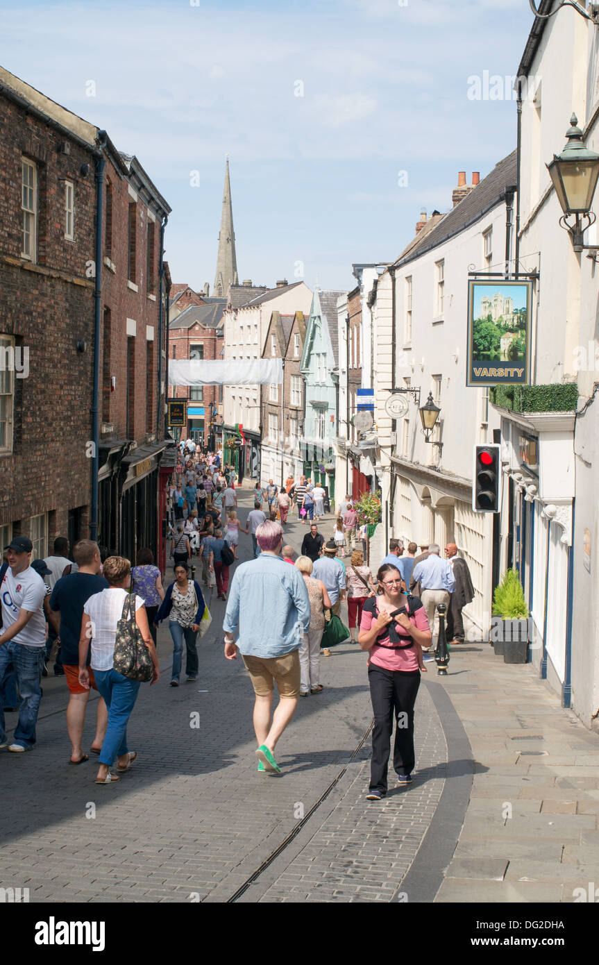 People walking along Saddler St. in Durham City centre, England UK Stock Photo