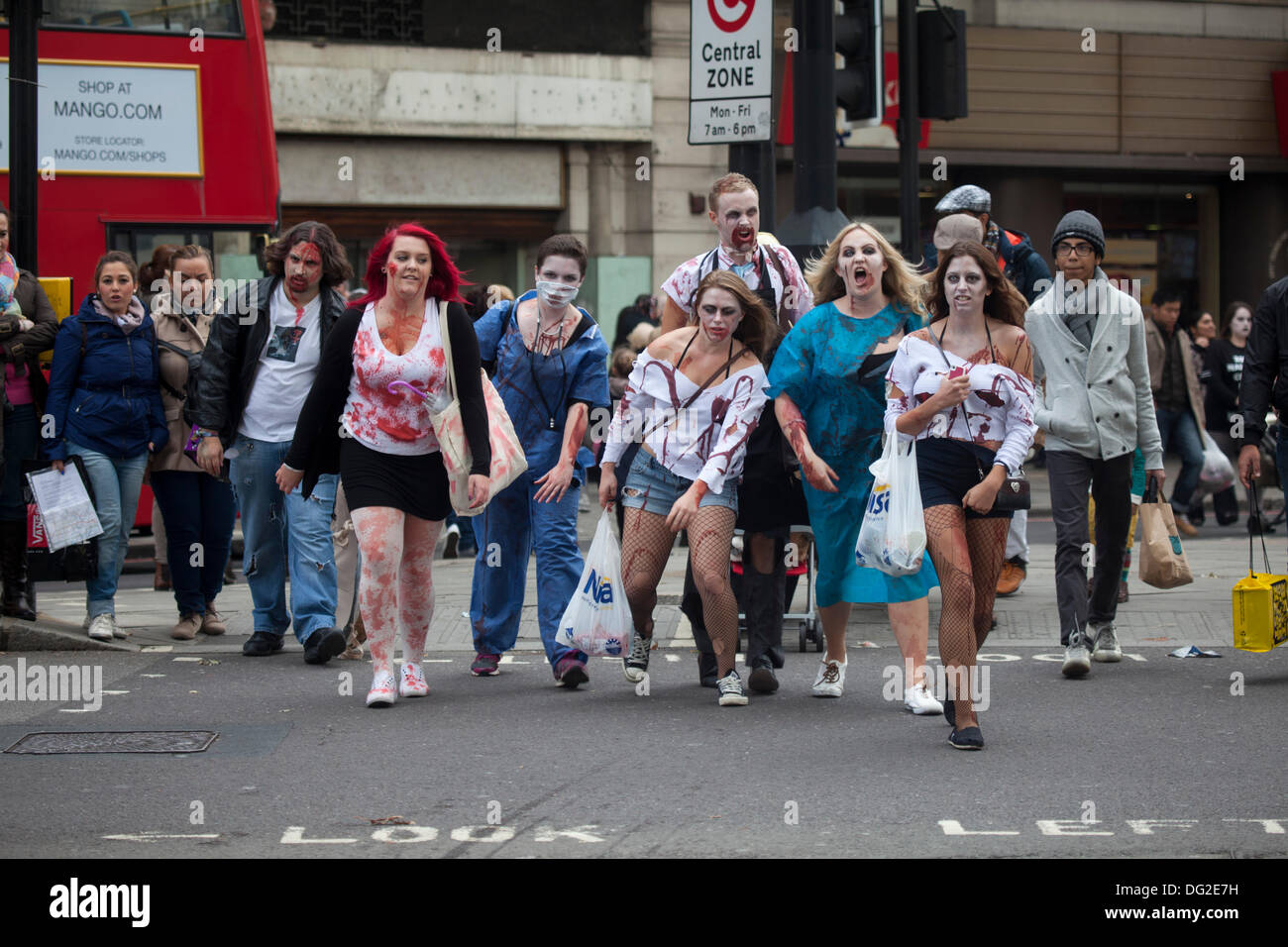 London, UK. 12th Oct, 2013. World Zombie Day: London, attracts thousands of zombies each year to groan and shamble through Central London in aid of the charity St. Mungo's. Credit:  Sebastian Remme/Alamy Live News Stock Photo