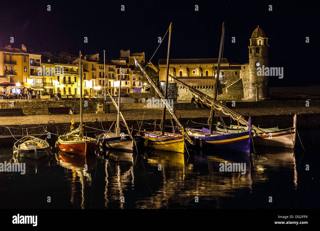 Classic Anchovy Fishing Boats Moored in Colloiure Harbour for the Tourists to Enjoy Stock Photo