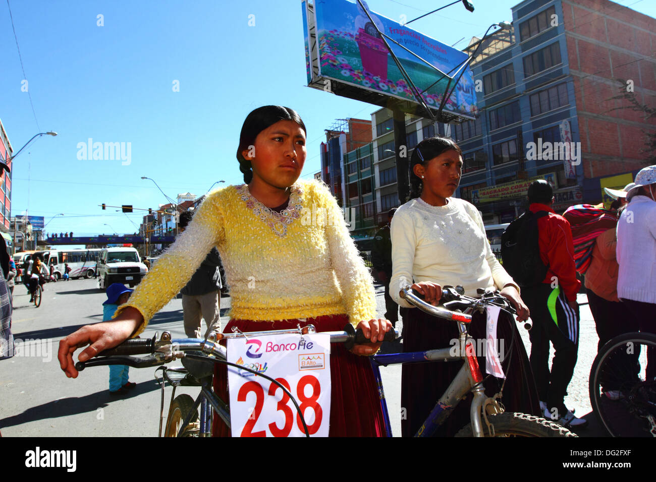 El Alto, Bolivia. 12th Oct, 2013.  Competitors line up before the start of a Cholitas Bicycle Race for indigenous Aymara women. The race is held at an altitude of just over 4,000m along main roads in the city of El Alto (above the capital, La Paz) for Bolivian Womens Day, which was yesterday Friday October 11th. Credit:  James Brunker / Alamy Live News Stock Photo