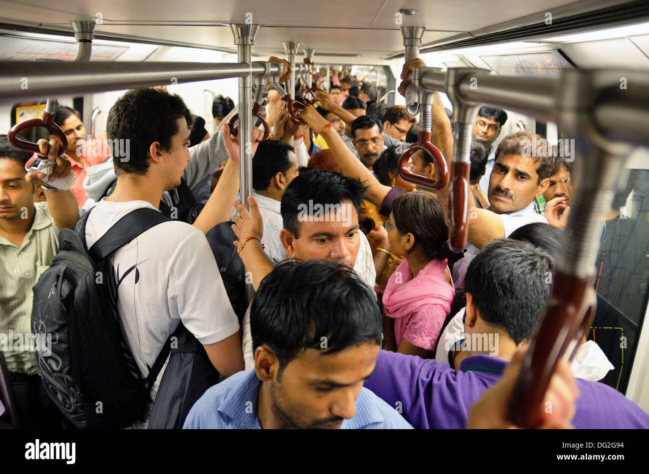 Crowded Delhi subway train, India Stock Photo
