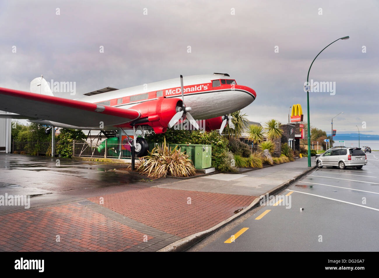 Taupo, North Island, New Zealand. McDonald's restaurant, Taupo with DC3 Dakota aircraft. Reputedly voted coolest McDonald's in the world. Stock Photo