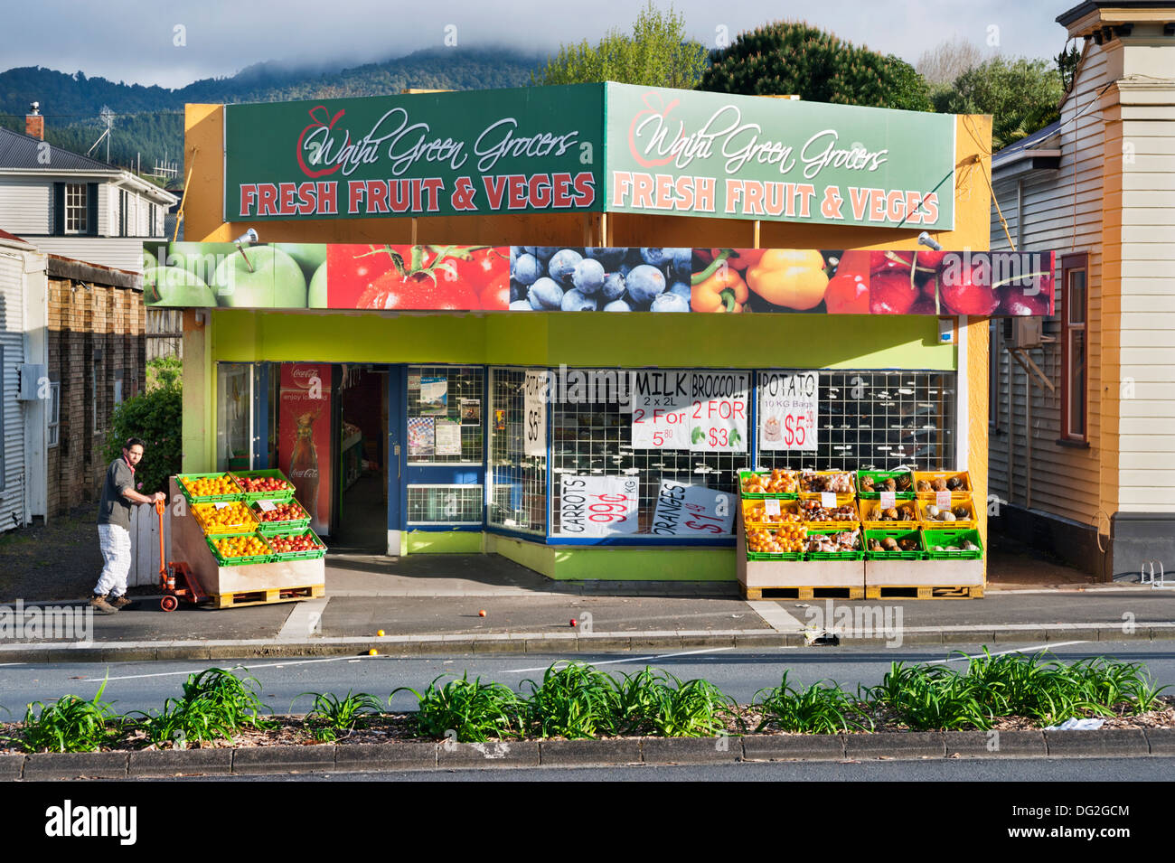 Waihi, north island, New Zealand. Grocer opens his store early in the