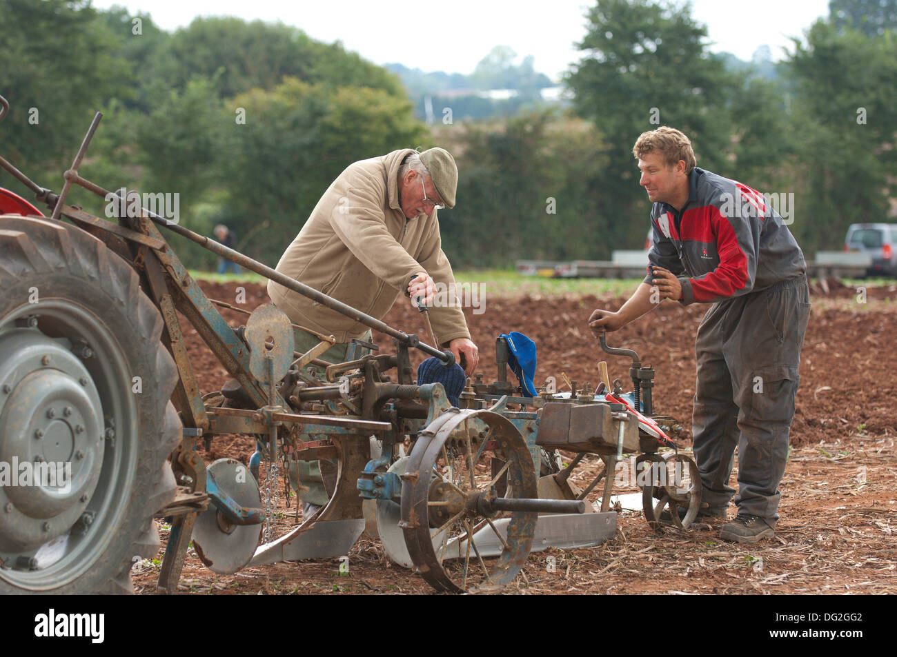 Llanwarne, Herefordshire, UK. 12th October 2013. Contestants take part in the Class 5 Oat Seed Furrow Ploughing event. More than 230 top British ploughmen compete in the 2013 British National Ploughing Championships which have returned to Herefordshire for the first time in 27 years. The top ploughmen of  each class (reversible and conventional) will represent Britain at the World Ploughing Championships to be held in France in 2014. Photo credit: Graham M. Lawrence/Alamy Live News. Stock Photo