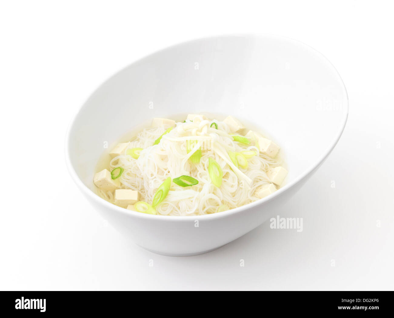 A bowl of miso noodle soup isolated on a white background. Stock Photo