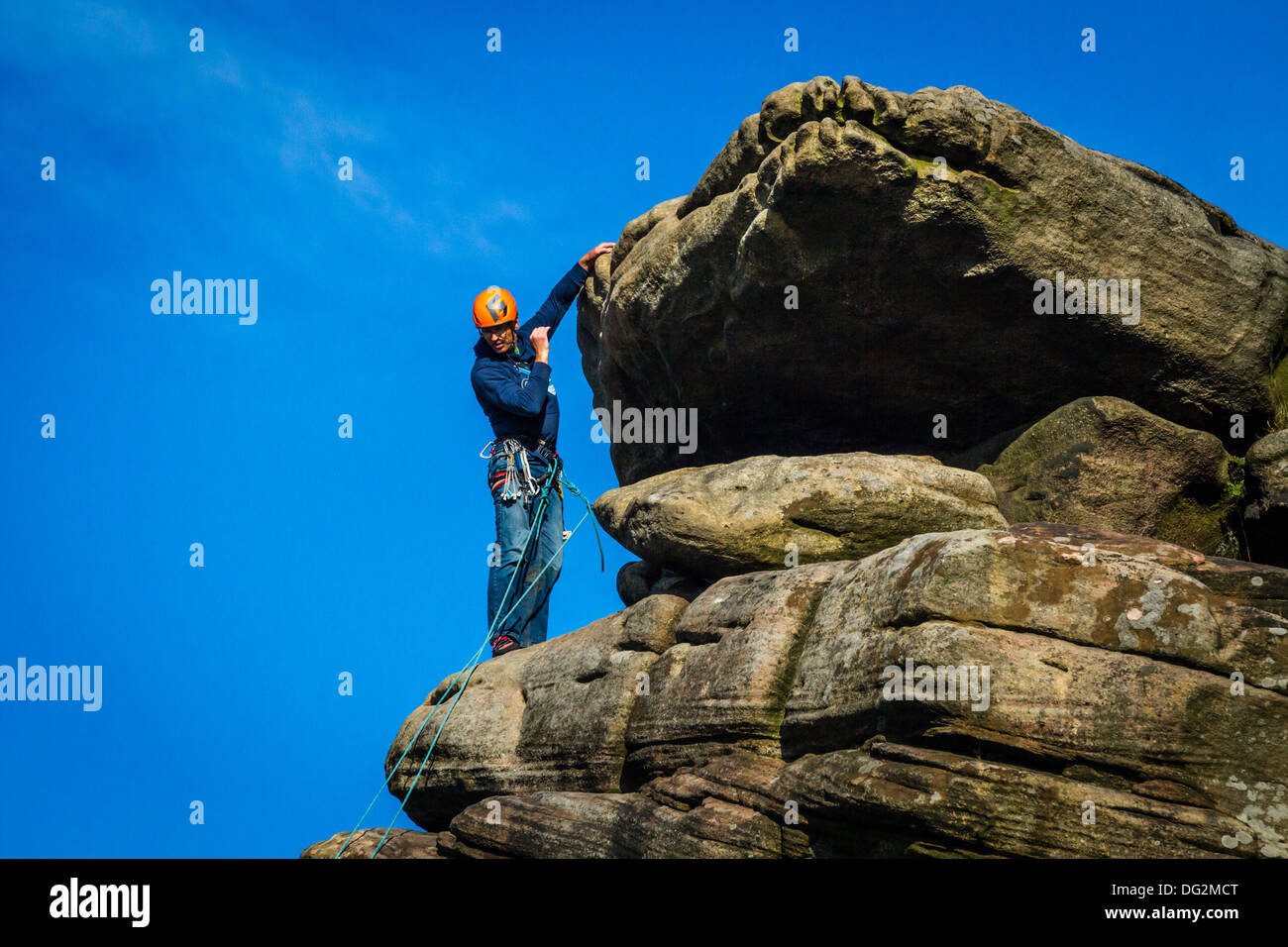 Male climber moving down on hi-res stock photography and images - Alamy
