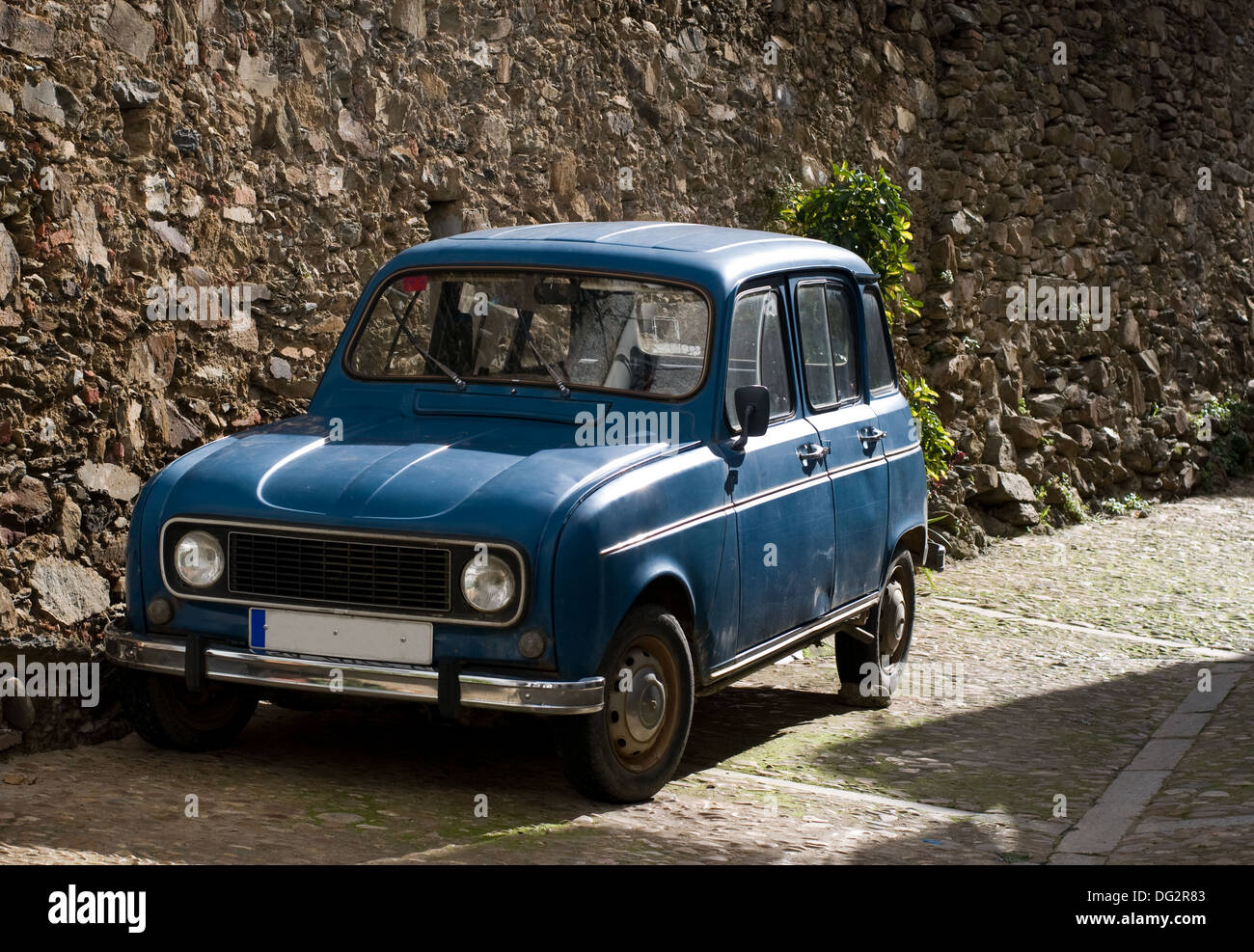 Antique blue car in rural ambient. Stock Photo