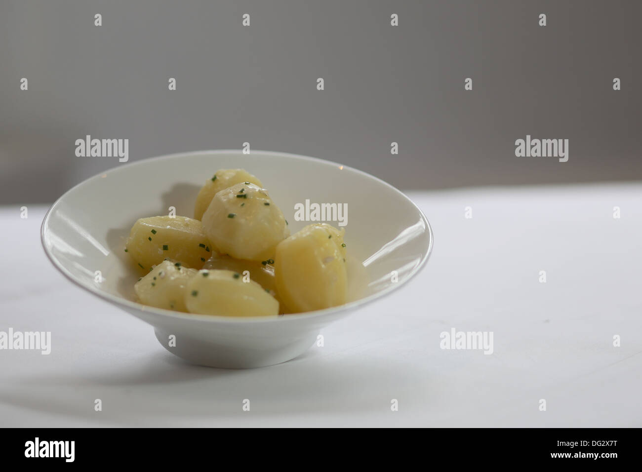 Boiled potatoes with parsley Stock Photo